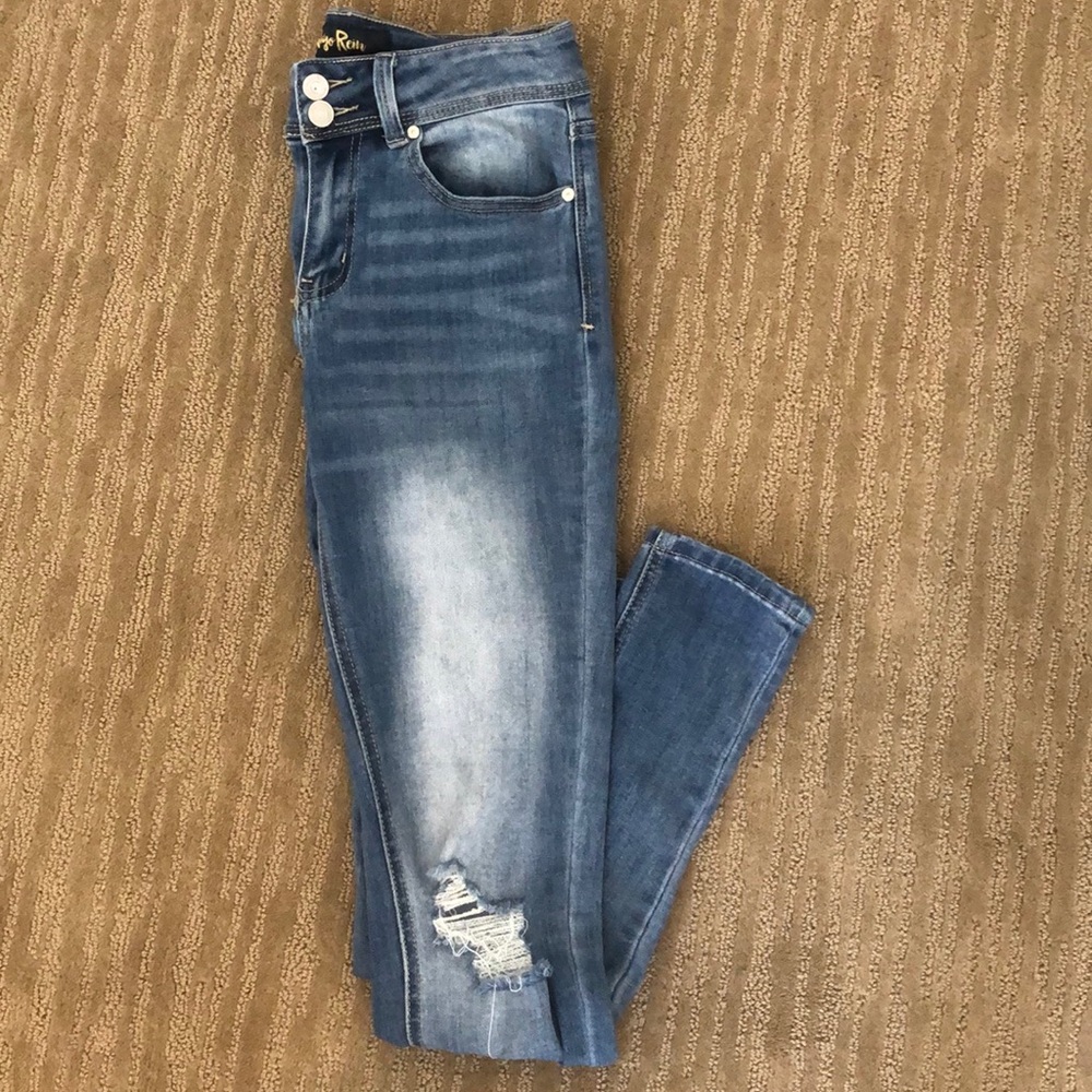 Ripped light wash skinny jeans